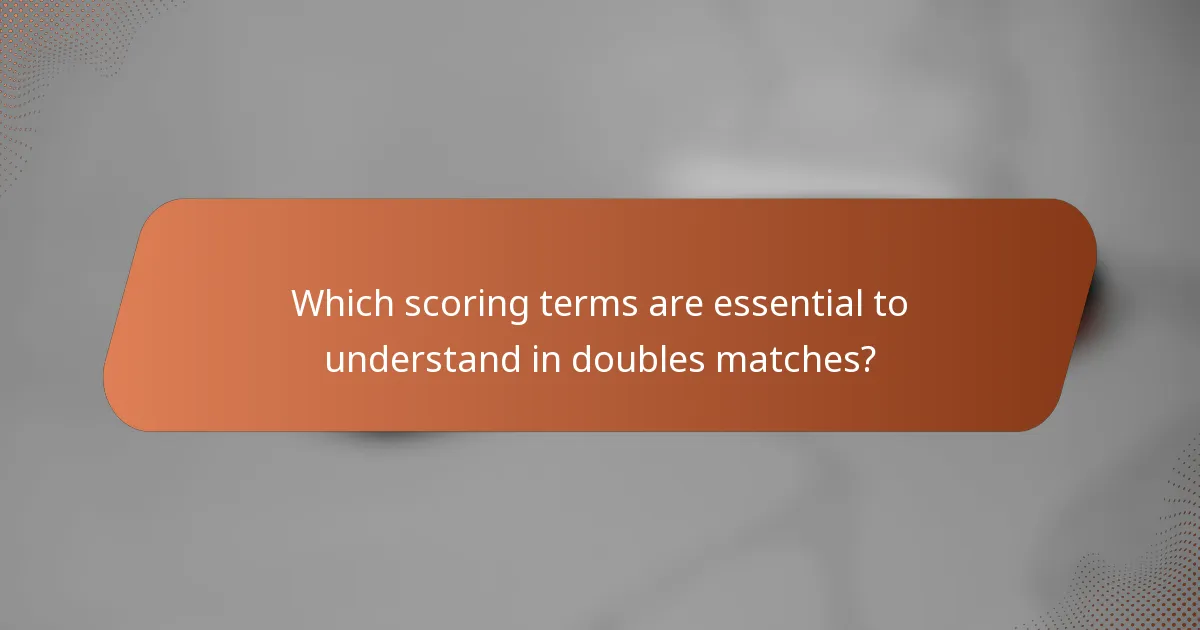 Which scoring terms are essential to understand in doubles matches?
